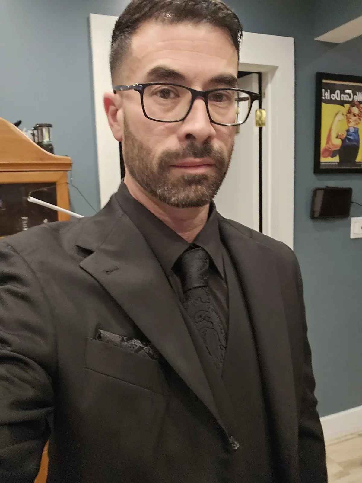 Anthony - blue shirt with laptop